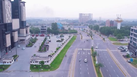Wide tree-lined boulevard in DHA Lahore showcasing world-class infrastructure and urban planning